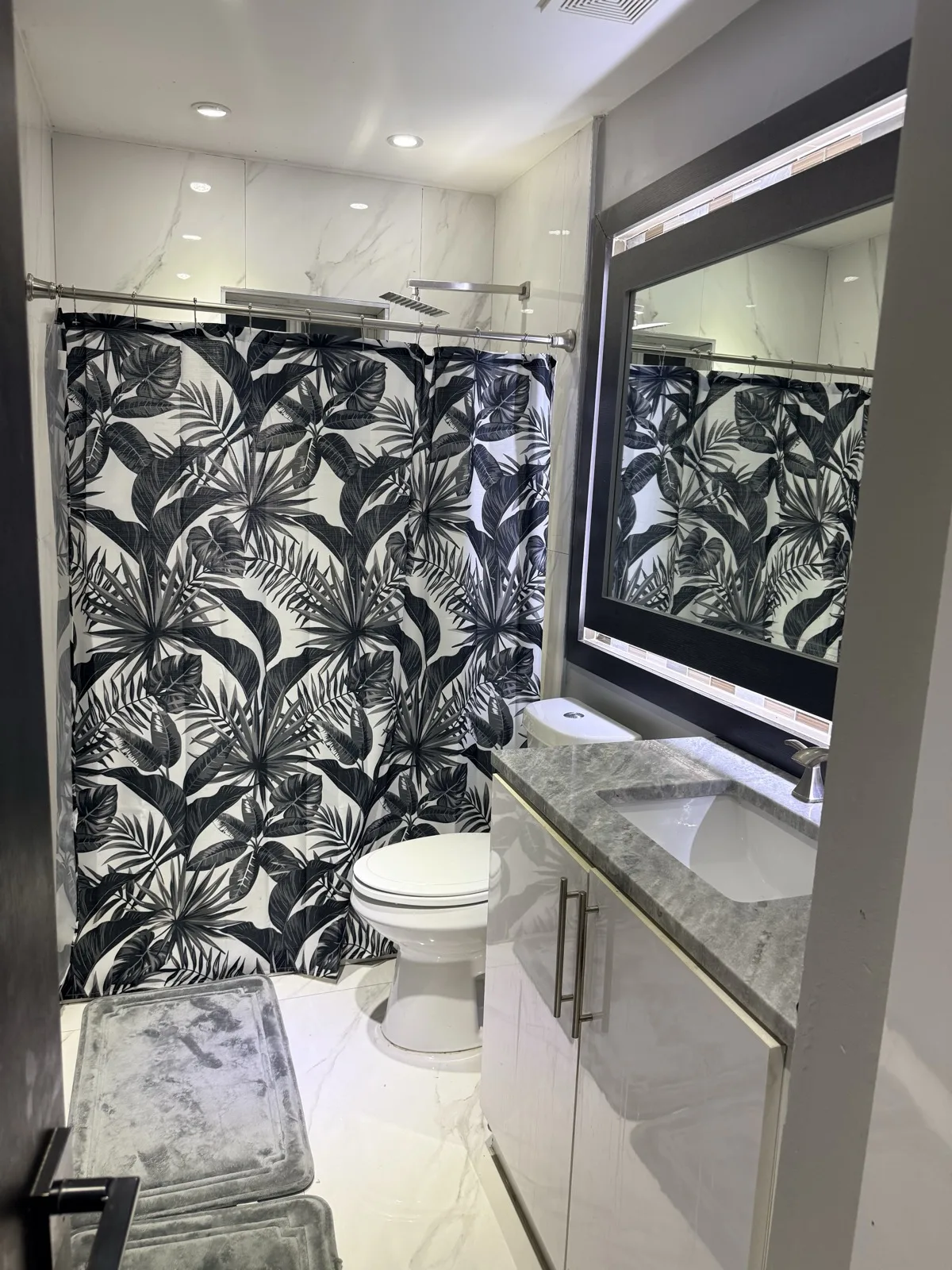 Clean warm recovery suite bathroom for mommy makeover recovery